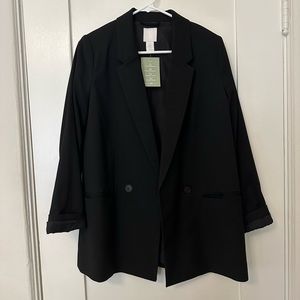 Double breasted black blazer. True to size